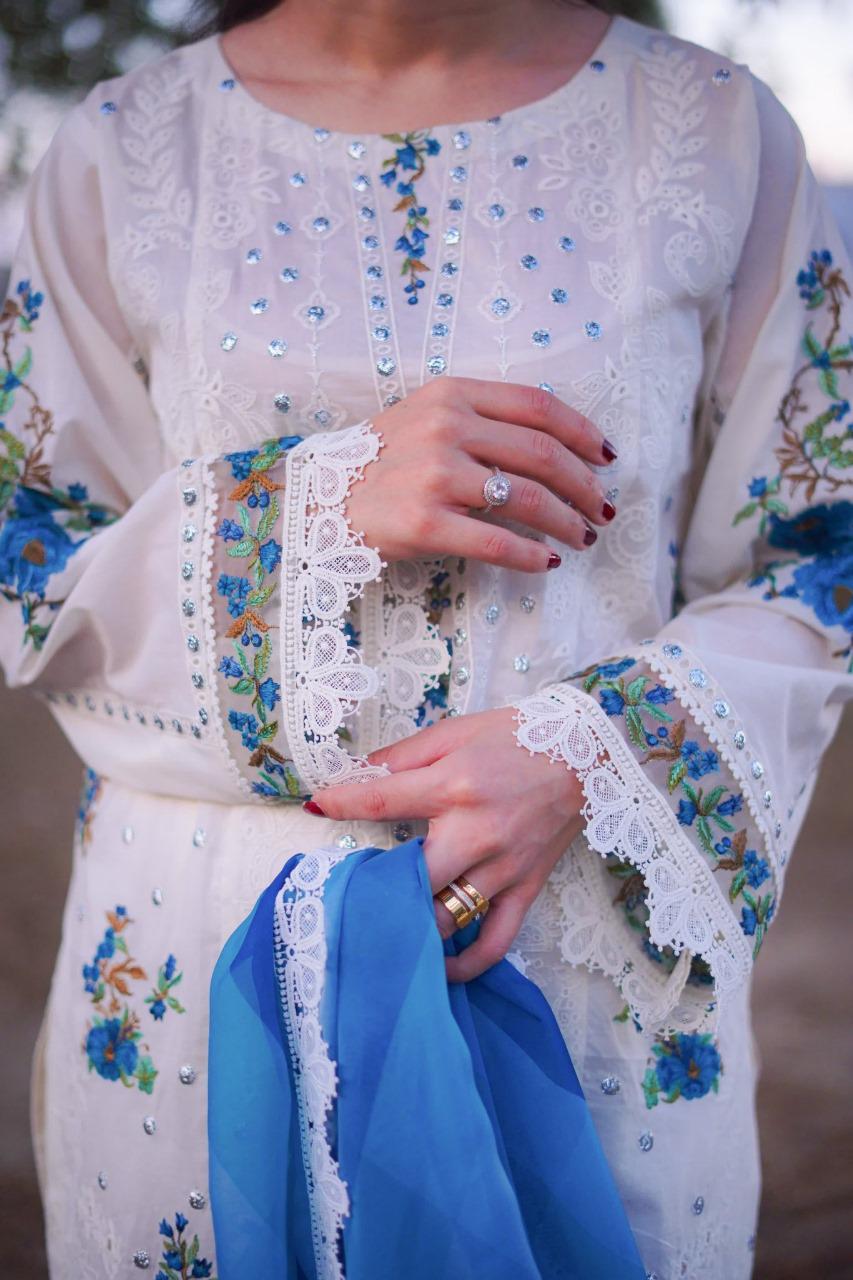 Saroya Luxury Lawn Stitched 3 Piece Suit – White Embroidered with Blue Printed Dupatta